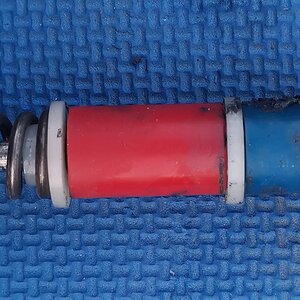 spring stack - rod (white damper elastomer missing goes under preload nut