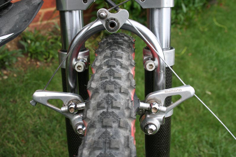 Front brake set-up, behind forks.